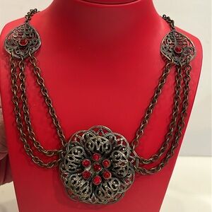 Antique Necklace with Large Flower having 9 Ruby Colored Rhinestones